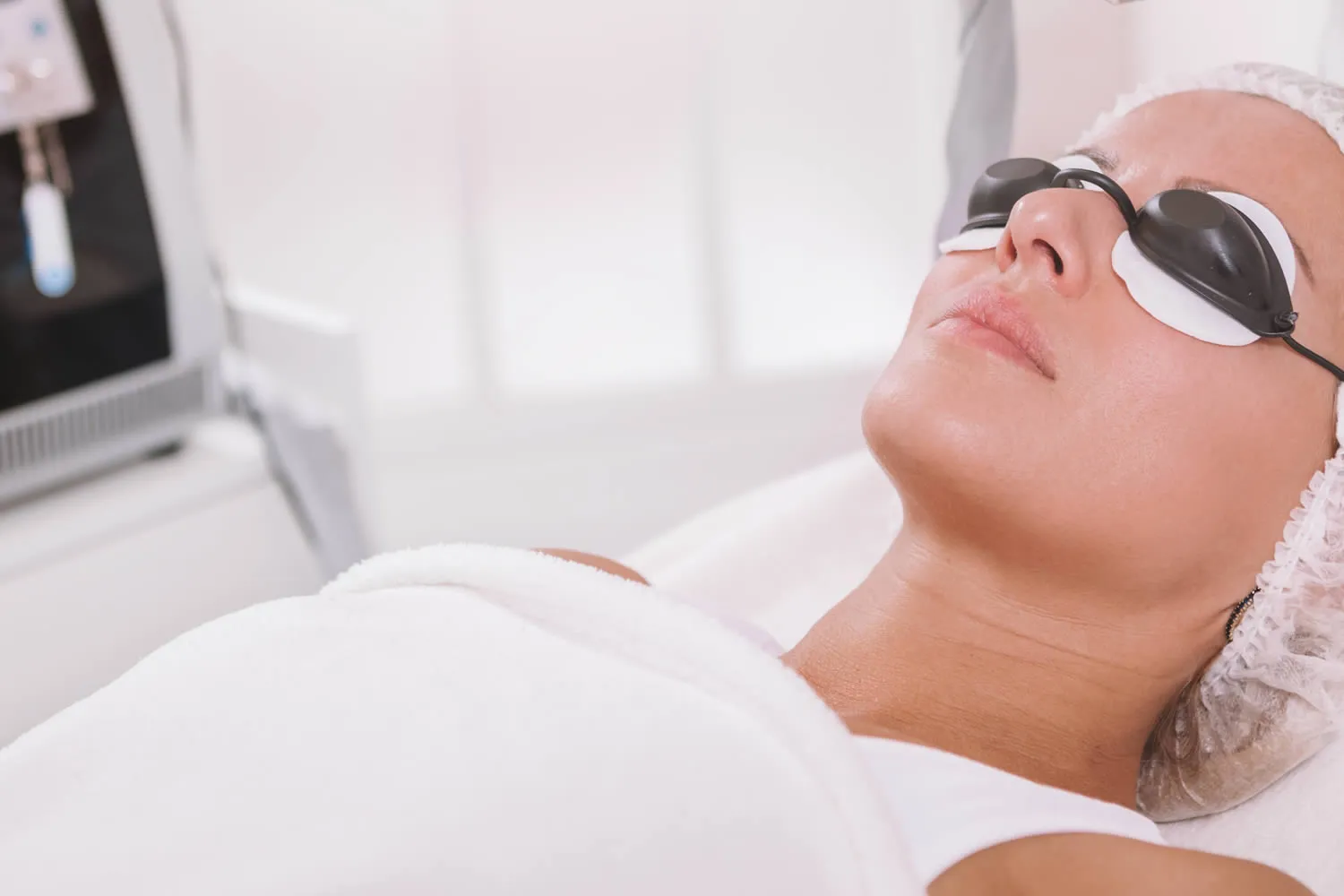 medical dermatology woman plasma skin regeneration treatment at dermatology office