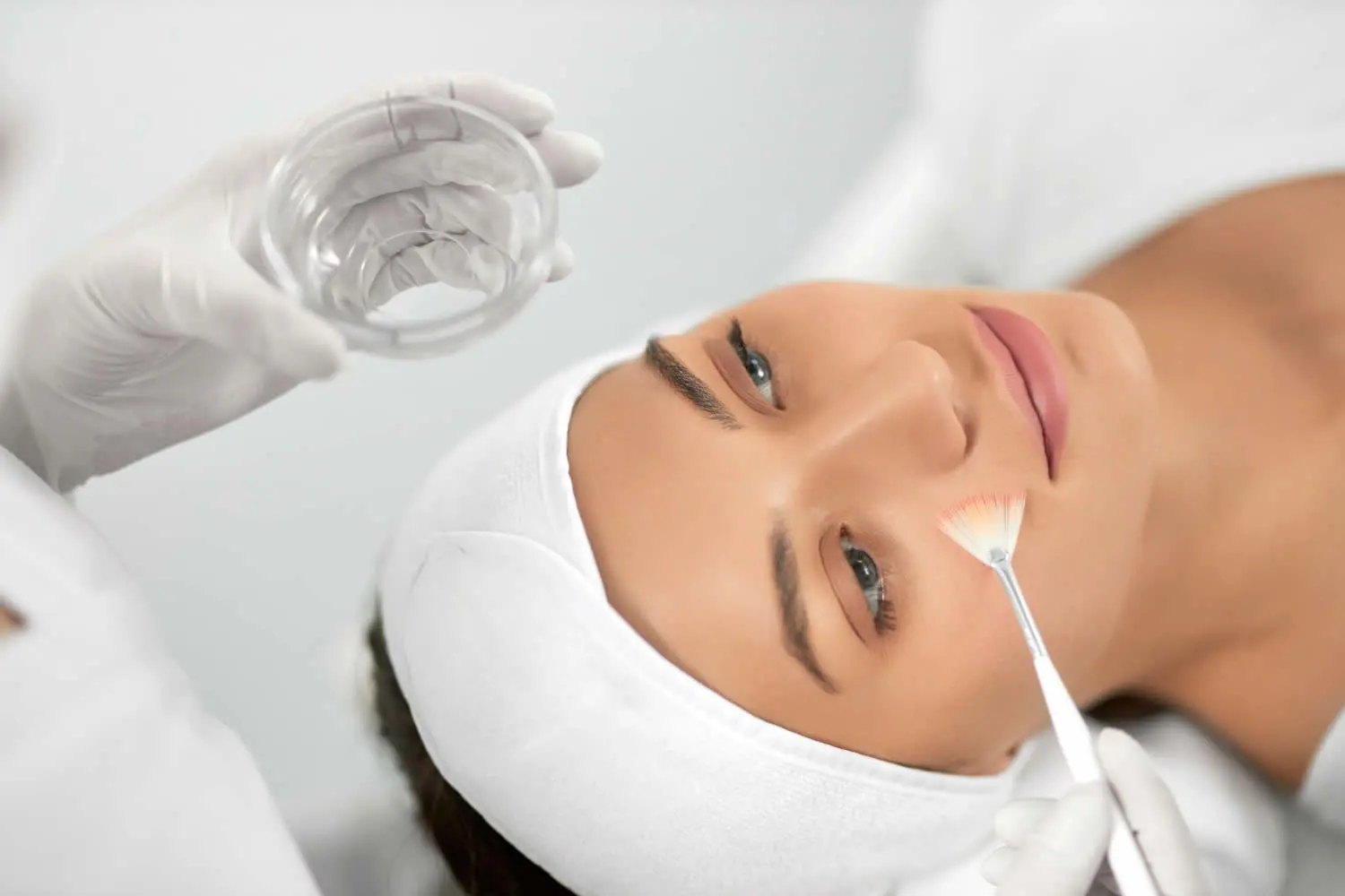 medical dermatology woman young-woman-doing-procedure-face-beautician-chemical-peel